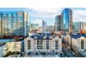 Apartment complex with city skyline views, parking, pool and balconies in a modern urban setting at 1075 Peachtree Ne Walk # A519, Atlanta, GA 30309