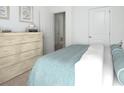 Bright bedroom featuring neutral decor, plush bedding, and ample natural light at 318 Naples Dr, Locust Grove, GA 30248
