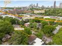 A scenic aerial view showcases the home's proximity to the Beltline, Ponce City Market, and O4W Park in vibrant Atlanta at 811 Ponce De Leon Ne Pl, Atlanta, GA 30306