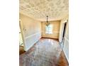 Empty dining room with damage that needs repair at 1386 Bluefield Sw Dr, Atlanta, GA 30310