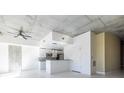 Modern open-concept kitchen with stainless steel appliances and sleek minimalist design at 335 W Ponce De Leon Ave # 506, Decatur, GA 30030