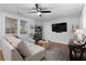 Comfortable living room with hardwood floors, a plush sectional, and modern décor at 1963 Main Nw St, Atlanta, GA 30318