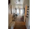 Inviting entryway flowing into a beautifully decorated living area with a cozy sofa and lots of light at 2742 Snapfinger Manor, Decatur, GA 30035
