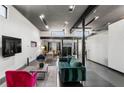 Bright and spacious living room with hardwood floors and exposed beams at 175 Moreland Se Ave, Atlanta, GA 30316