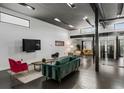 Bright and spacious living room with hardwood floors and exposed beams at 175 Moreland Se Ave, Atlanta, GA 30316