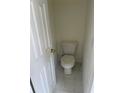 A small bathroom with a toilet at 203 Sea Marsh Ct, Fayetteville, GA 30215