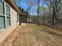 This property features a backyard with a covered back porch at 333 Darlington Dr, Ellenwood, GA 30294