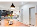 Open-concept area that shows both the living room and kitchen, seamlessly connected for modern living at 1506 Avon Sw Ave, Atlanta, GA 30311