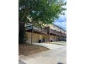 View of garages and decks of a residential townhome complex at 3923 High Dove Sw Way # 16, Smyrna, GA 30082