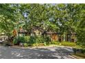 Charming townhome complex with lush greenery, offering a serene and private living environment at 432 Ansley Walk Ne Ter, Atlanta, GA 30309