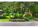 Beautiful landscaping and manicured lawn at the street corner, showcasing neighborhood pride at 432 Ansley Walk Ne Ter, Atlanta, GA 30309