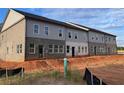 New construction townhomes featuring brick and siding exterior, showcasing modern architectural design at 3108 Marbella Cir # 4, Kennesaw, GA 30152