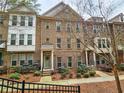 Attractive townhomes with brick facades, landscaped yards, and inviting entrances enhance curb appeal at 2168 Rock Creek Park, Decatur, GA 30033