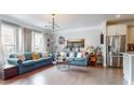 Inviting living room featuring hardwood floors, stylish furnishings, and plenty of natural light at 2168 Rock Creek Park, Decatur, GA 30033