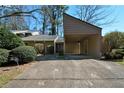 Charming home with a single-car carport in a desirable community at 154 Weatherly Way, Alpharetta, GA 30009