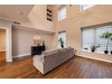 A bright open living room with hardwood floors and large windows at 2626 Peachtree Nw Rd # 412, Atlanta, GA 30305