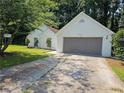 One-story home with attached garage, brick exterior and driveway at 4093 Chapel Mill Bnd, Decatur, GA 30034