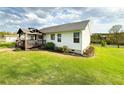 Spacious backyard featuring a covered deck, perfect for outdoor entertaining at 273 Crowe Springs Nw Rd, Cartersville, GA 30121