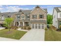 Beautiful two-story home featuring stone and brick accents and a spacious driveway at 4229 Brookmont Way, Auburn, GA 30011