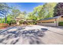 Wide driveway leads to a multi-car garage, offering lots of parking and storage space at 2701 East Mill Sw Way, Conyers, GA 30094