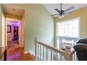 Bright entryway with hardwood floors, and a large window above the door letting in ample natural light at 990 Fox Valley Trl, Stone Mountain, GA 30088