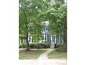 Charming exterior of a home, nestled among mature trees at 3516 Ashley Station Sw Dr, Marietta, GA 30008