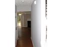 Open-concept space with hardwood floors and fireplace at 3516 Ashley Station Sw Dr, Marietta, GA 30008