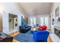 Bright living room with hardwood floors, fireplace, and French doors at 1864 Crestridge Ne Pl, Atlanta, GA 30345