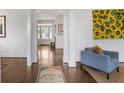 Bright foyer with hardwood floors, white trim, and an arched doorway at 219 Little John Ne Trl, Atlanta, GA 30309