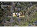 Aerial view of a home on a 0.37 acre lot with a yard and proximity to surrounding neighborhood at 840 Stonehaven Ln, Alpharetta, GA 30005