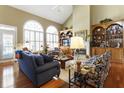Bright living room with large windows, hardwood floors, fireplace and custom built-ins at 3290 Winthrop Ne Cir, Marietta, GA 30067