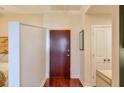 Hallway entrance with storage space and hardwood floors leading into a bedroom at 3300 Windy Ridge Se Pkwy # 612, Atlanta, GA 30339