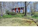 Traditional brick home on a lush lot, featuring classic design and inviting curb appeal at 910 Brentwood Ave, Lawrenceville, GA 30044