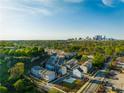 Aerial view of new construction townhomes in a community near the city skyline at 399 Se Skylar Way, Atlanta, GA 30315