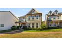 Well-maintained two-story home with a manicured lawn and inviting curb appeal at 3673 Madison St, Atlanta, GA 30337