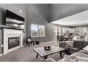Bright living room with fireplace, vaulted ceilings, and seamless open-concept layout at 3673 Madison St, Atlanta, GA 30337