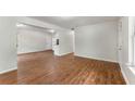 Open concept living room featuring wood flooring and ample natural light at 700 Thomasville Se Blvd, Atlanta, GA 30315