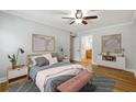 Cozy bedroom with ceiling fan, wood floors, and stylish decor at 4430 Tilly Mill Rd # 1304, Atlanta, GA 30360