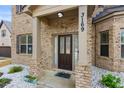 Inviting front porch with a well-maintained yard and a view of the house number at 3169 Shadystone Way, Loganville, GA 30052