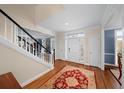 Welcoming foyer with hardwood floors and staircase at 710 Greystone Ne Park, Atlanta, GA 30306