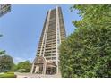 High-rise building with multiple balconies and a grand entrance at 750 Park Ne Ave # 18S, Atlanta, GA 30326