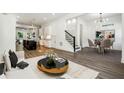 Open floor plan featuring living room, dining area, and island kitchen with modern finishes at 1045 Mcdaniel St, Atlanta, GA 30310