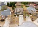 Aerial view of a neighborhood, showcasing the home's landscaped yard and proximity to other residences at 552 Lawton Bridge Sw Rd, Smyrna, GA 30082