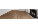 Living room with wood floors and a fireplace at 1017 Dunbar Dr, Atlanta, GA 30338