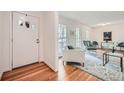Cozy living room with hardwood floors, light walls, and tasteful furnishings at 4089 Menlo Dr, Tucker, GA 30084