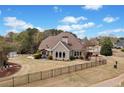 Spacious backyard with fence, patio, and well-maintained landscaping at 179 Country Club Dr, Hiram, GA 30141