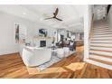 Bright living room with hardwood floors, fireplace, and open floor plan at 2018 Presley Ne Way, Atlanta, GA 30317