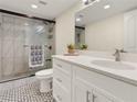 Updated bathroom with a tiled shower, modern vanity, and sleek fixtures at 2870 Pharr Court South Nw # 504, Atlanta, GA 30305