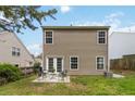 A cozy backyard with patio seating provides a relaxing outdoor space at 261 Silver Ridge Dr, Dallas, GA 30157