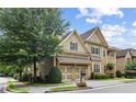 Charming two-story home with well-maintained landscaping, showcasing a blend of traditional and modern design at 325 Valley Brook Way, Atlanta, GA 30342